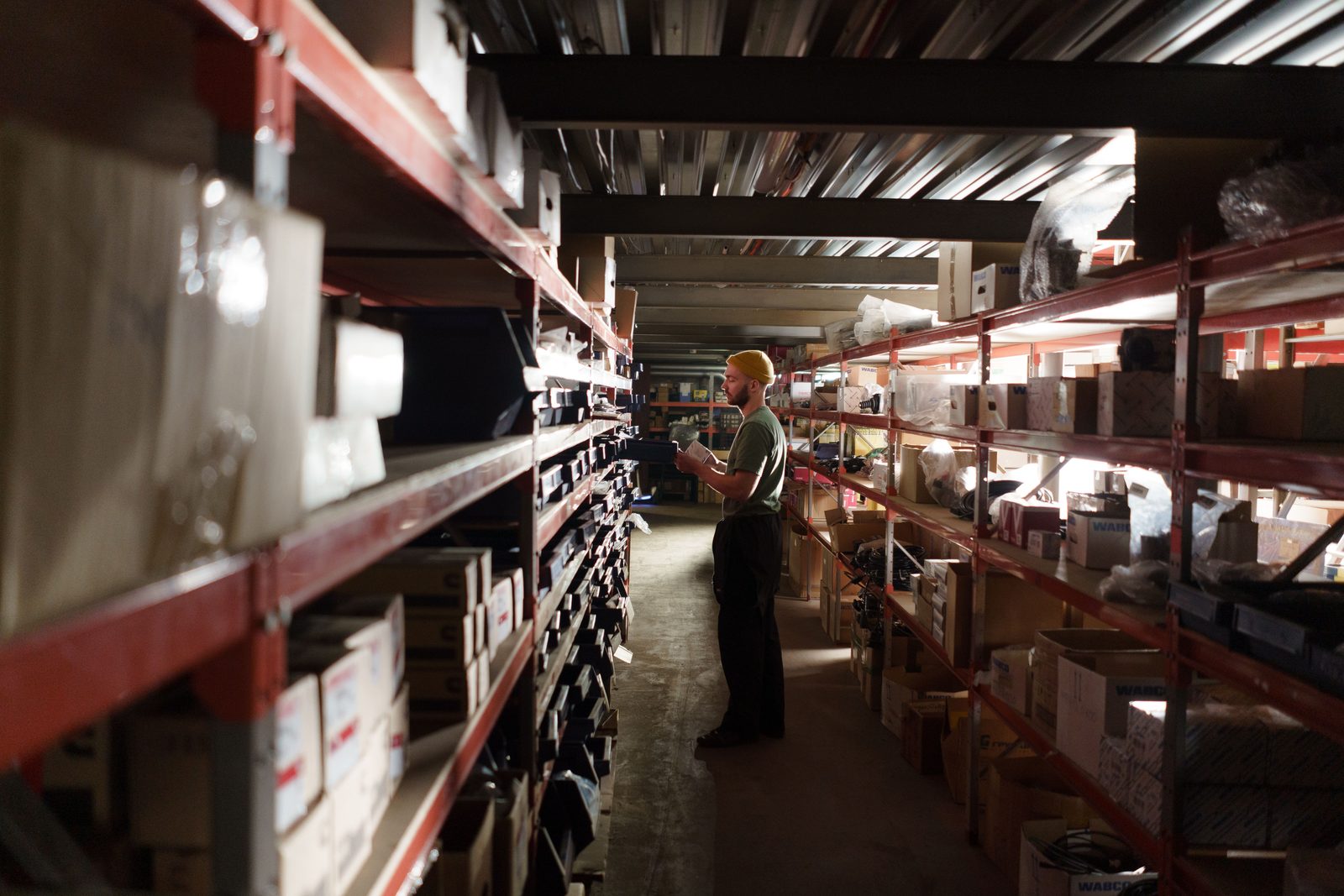 Organised stock shelves in a trade storage area